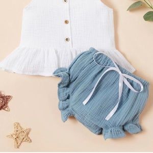 Baby White top with blue bottoms